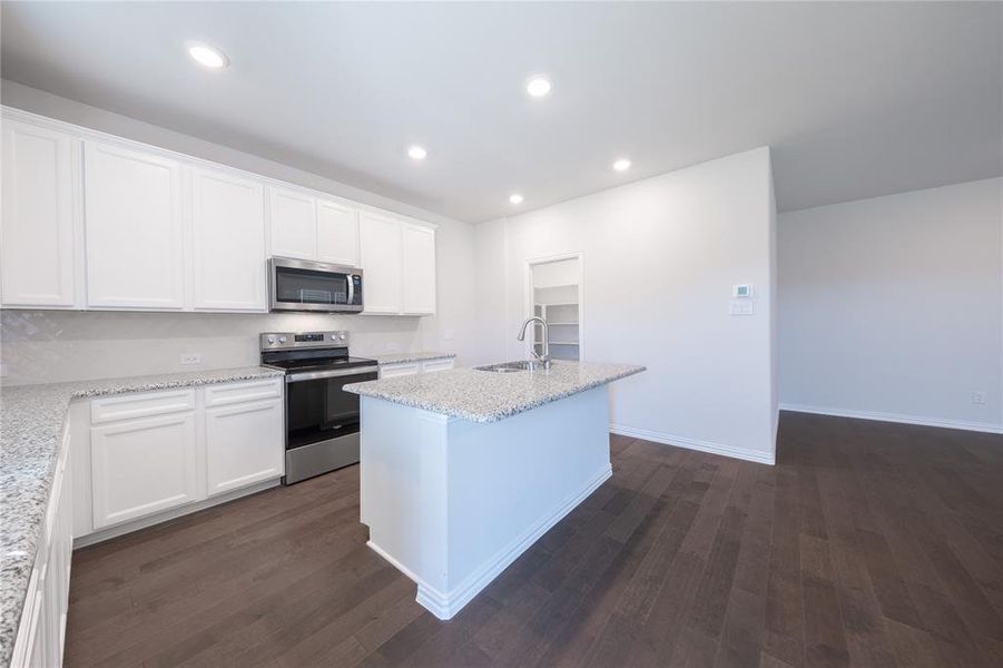 Furnished interior view inside a new home in Churchill: Fields 40', Anna (Image 8). Furnished interior view inside a new home in Churchill: Fields 40', Anna (Image 8).