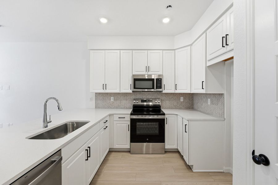 Furnished interior view inside a new home in Trailstone, Arvada (Image 4).