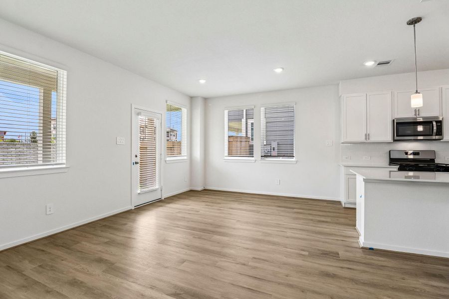 Photos are not of the actual home, but are photos of the builder home with same floorplan with similar interior finishes.