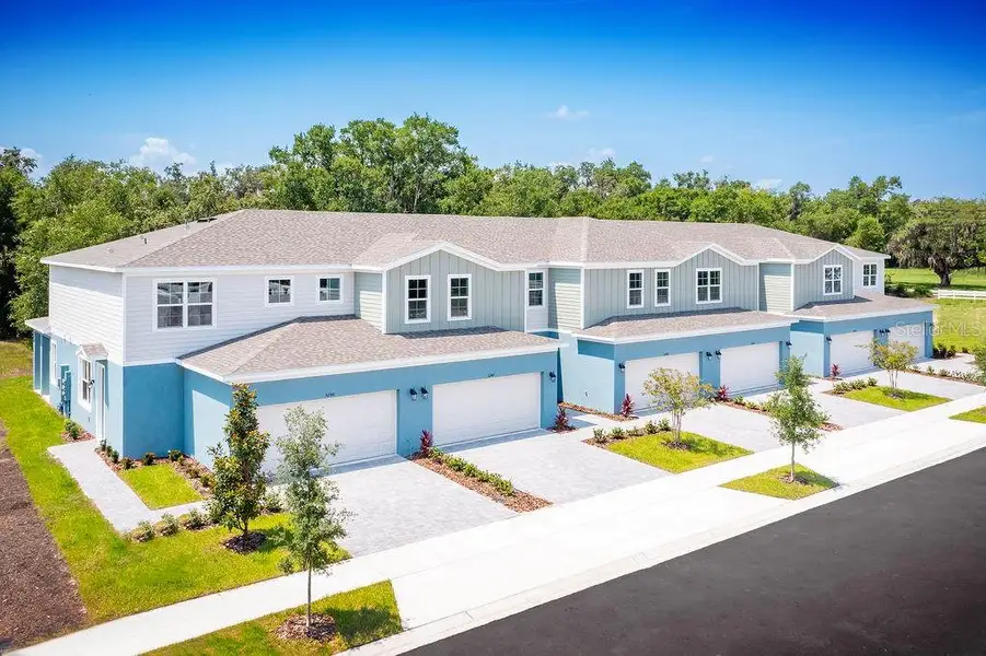 Front exterior of a new home in Terra Haven, St. Cloud, FL, highlighting curb appeal (Image 1). Front exterior of a new home in Terra Haven, St. Cloud, FL, highlighting curb appeal (Image 1).