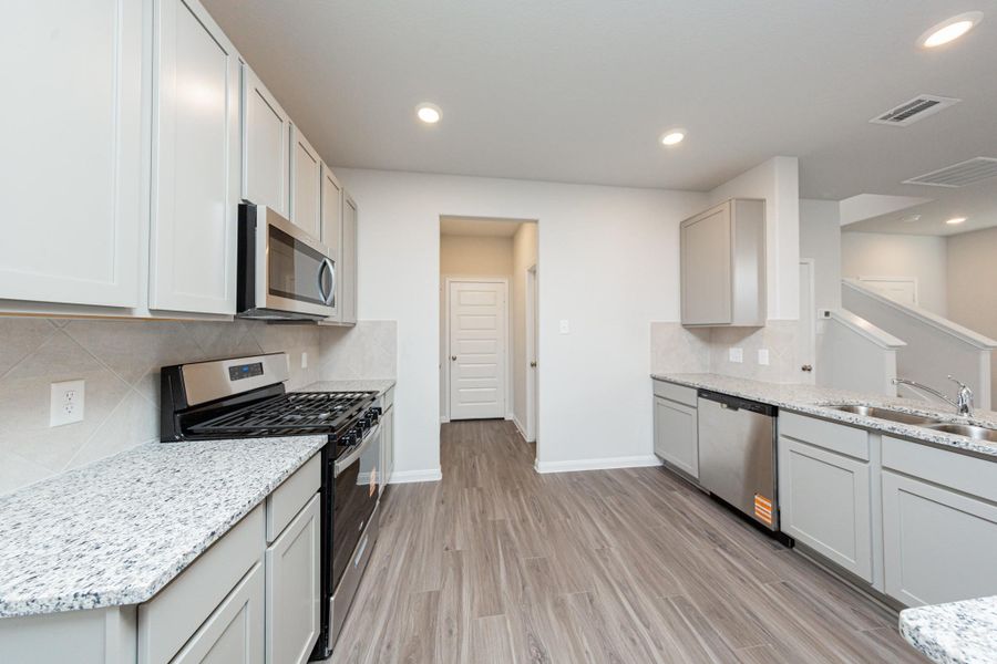 Furnished interior view inside a new home in River's Edge, Conroe (Image 7).