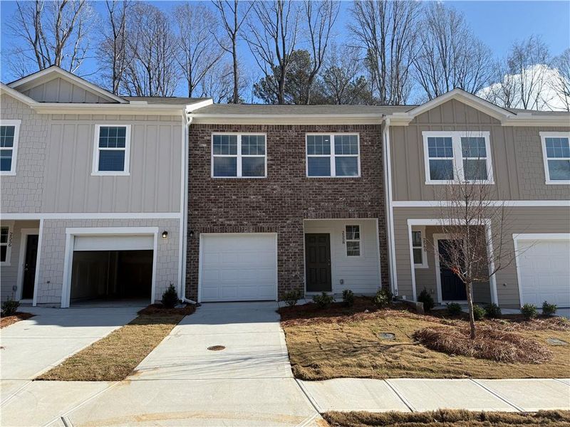 Front exterior of a new home in , Atlanta, GA, highlighting curb appeal (Image 1). Front exterior of a new home in , Atlanta, GA, highlighting curb appeal (Image 1).