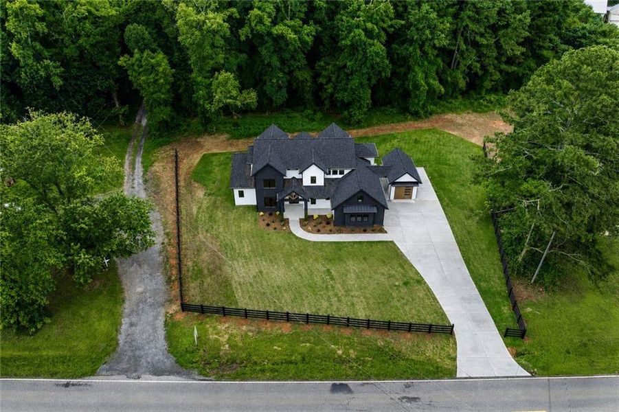 Front exterior of a new home in , Cumming, GA, highlighting curb appeal (Image 32).