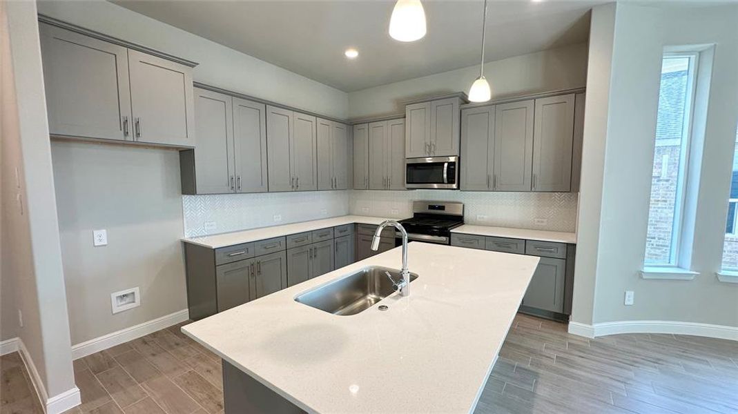 Kitchen - All Home and community information, including pricing, included features, terms, availability and amenities, are subject to change at any time without notice or obligation. All Drawings, pictures, photographs, video, square footages, floor plans, elevations, features, colors and sizes are approximate for illustration purposes only and will vary from the homes as built.