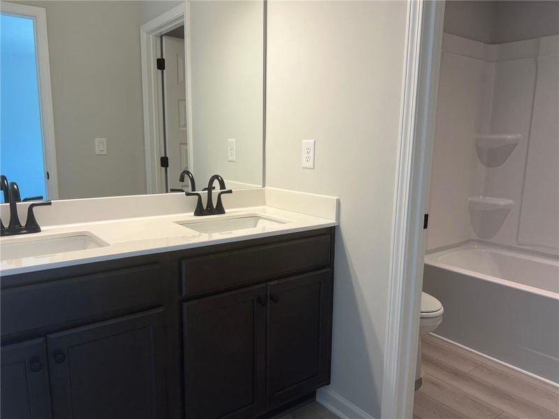 Furnished interior view inside a new home in Crofton Place Enclave, Snellville (Image 11). Furnished interior view inside a new home in Crofton Place Enclave, Snellville (Image 11).