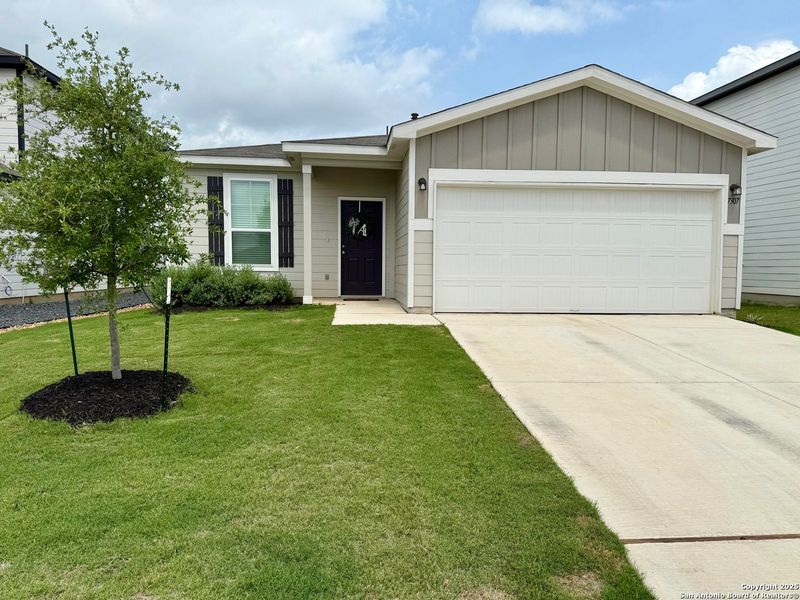 Front exterior of a new home in Winding Brook, San Antonio, TX, highlighting curb appeal (Image 18). Front exterior of a new home in Winding Brook, San Antonio, TX, highlighting curb appeal (Image 18).
