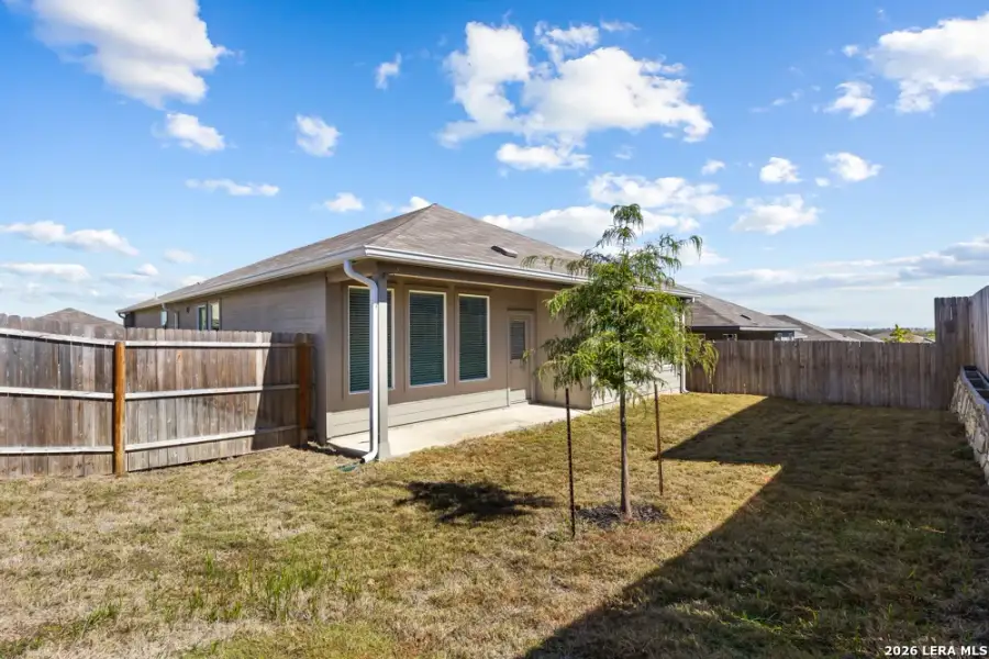 Exterior details and patio area of a home in Hightop Ridge, Converse (Image 3).