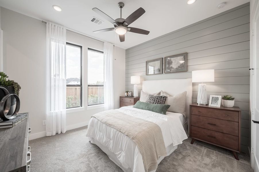 Representative furnished interior of a home built from the Carignan by Tri Pointe Homes in Woodson’s Reserve, Spring (Image 44).