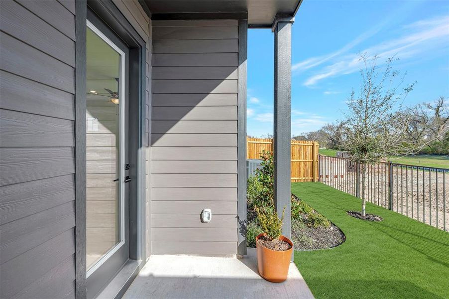 Exterior details and patio area of a home in Trails at Waterside - Garden Series, Fort Worth (Image 25). Exterior details and patio area of a home in Trails at Waterside - Garden Series, Fort Worth (Image 25).