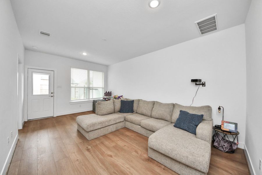 Furnished interior view inside a new home in Meridiana Courtyard Collection, Manvel (Image 10).