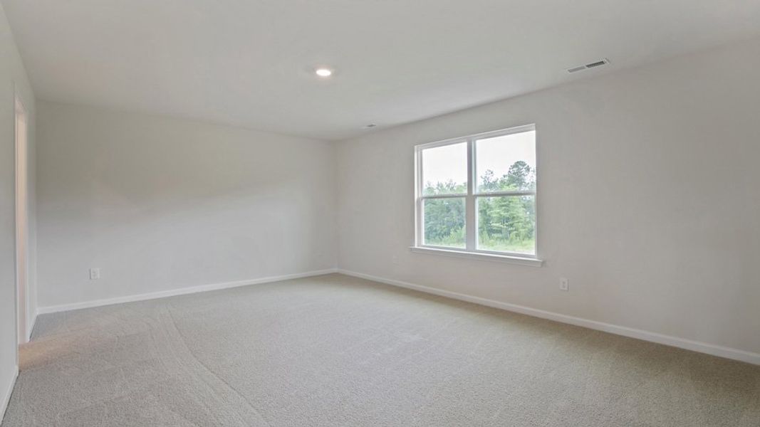Spacious, unfurnished interior of a new home in The Grove at Matthews Landing, Fuquay Varina (Image 29).