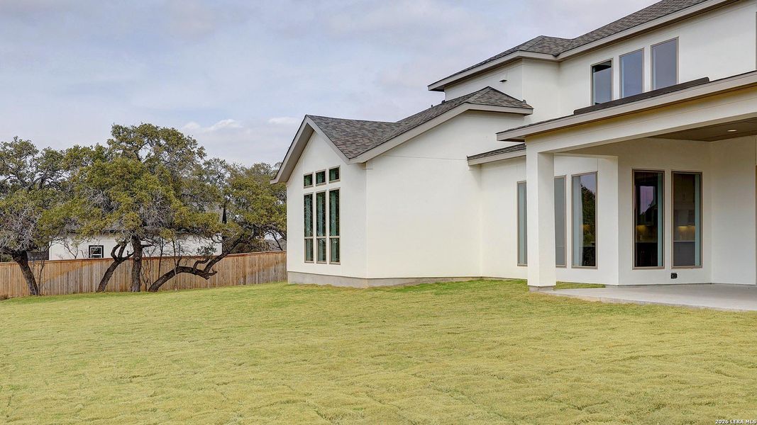 Exterior details and patio area of a home in Megan's Landing, Castroville (Image 4).