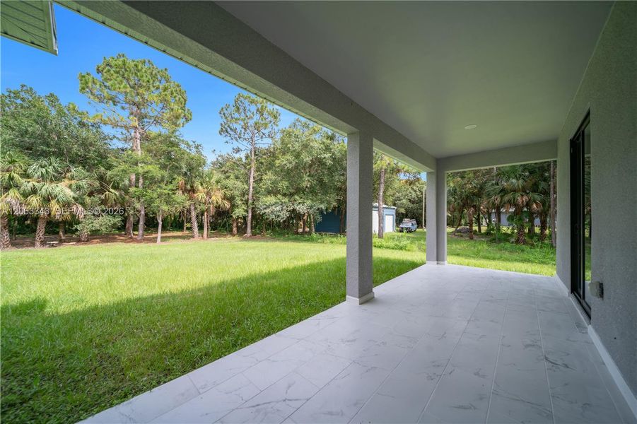 Exterior details and patio area of a home in , Lehigh Acres (Image 24). Exterior details and patio area of a home in , Lehigh Acres (Image 24).