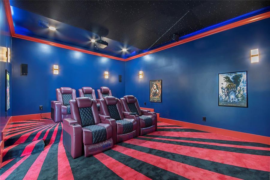 Cinema with crown molding and carpet flooring Cinema with crown molding and carpet flooring