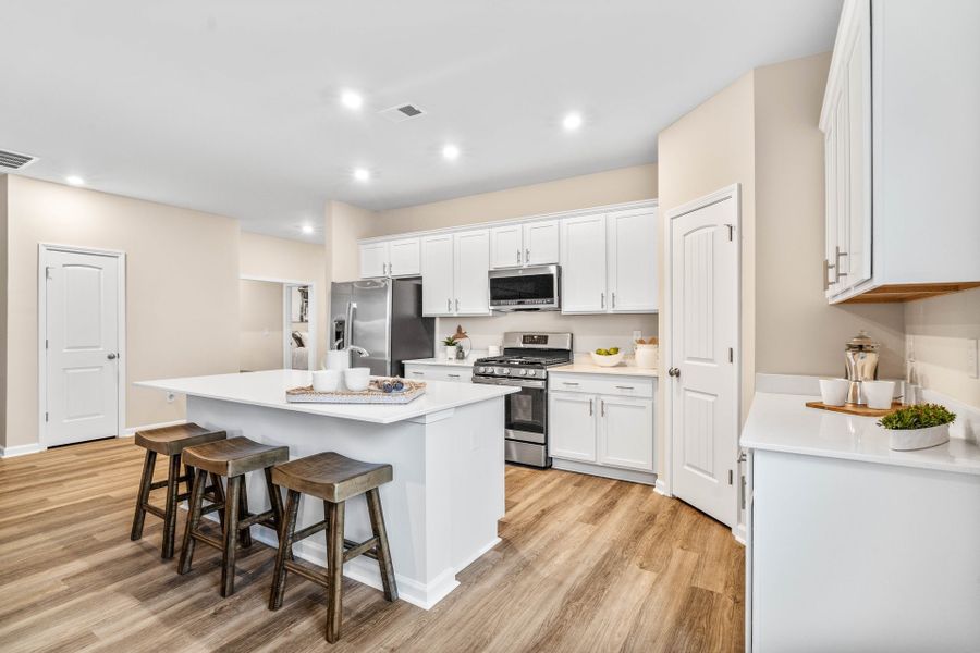 Representative furnished interior of a home built from the The Primrose by Chesapeake Homes in Terrapin, Leland (Image 9).