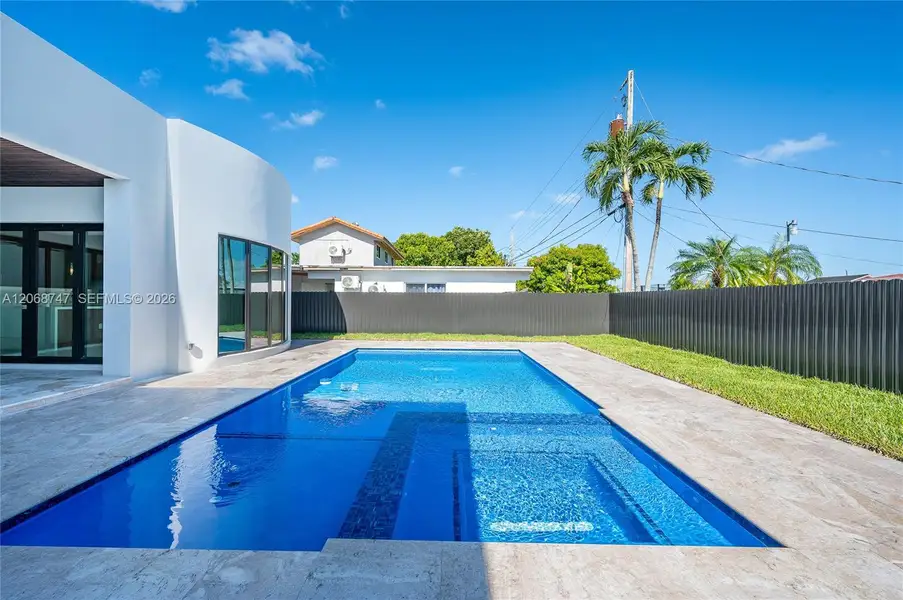 Exterior details and patio area of a home in , Miami (Image 18). Exterior details and patio area of a home in , Miami (Image 18).