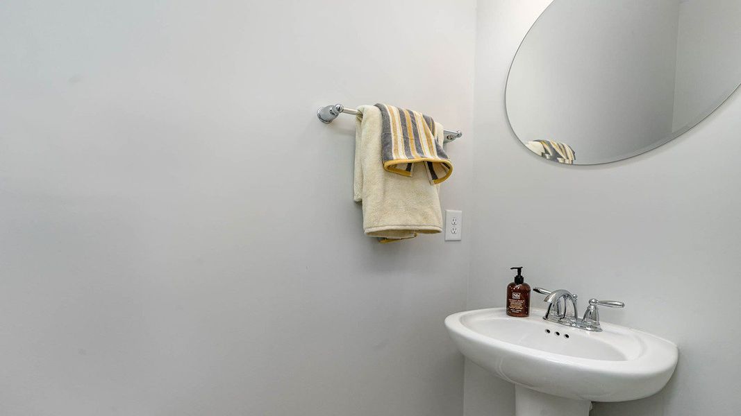 Representative furnished interior of a home built from the TILLMAN by D.R. Horton in Spring View Landing, Loris (Image 13).