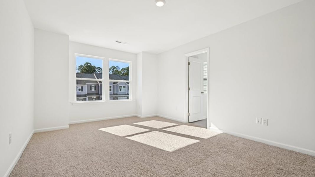Spacious, unfurnished interior of a new home in Chapel Townes, Raleigh (Image 22).