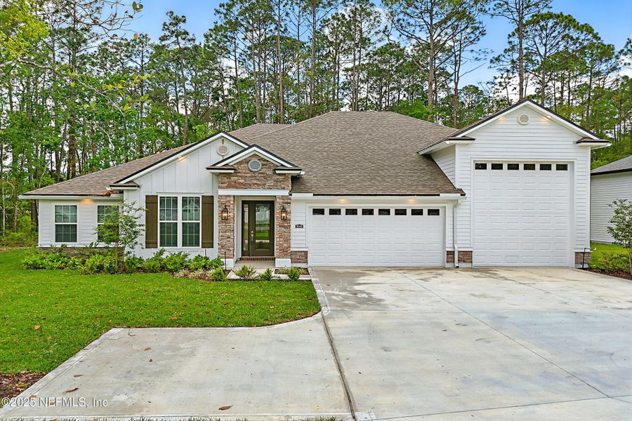 Front exterior of a new home in Goose Creek Estates, Green Cove Springs, FL, highlighting curb appeal (Image 24).