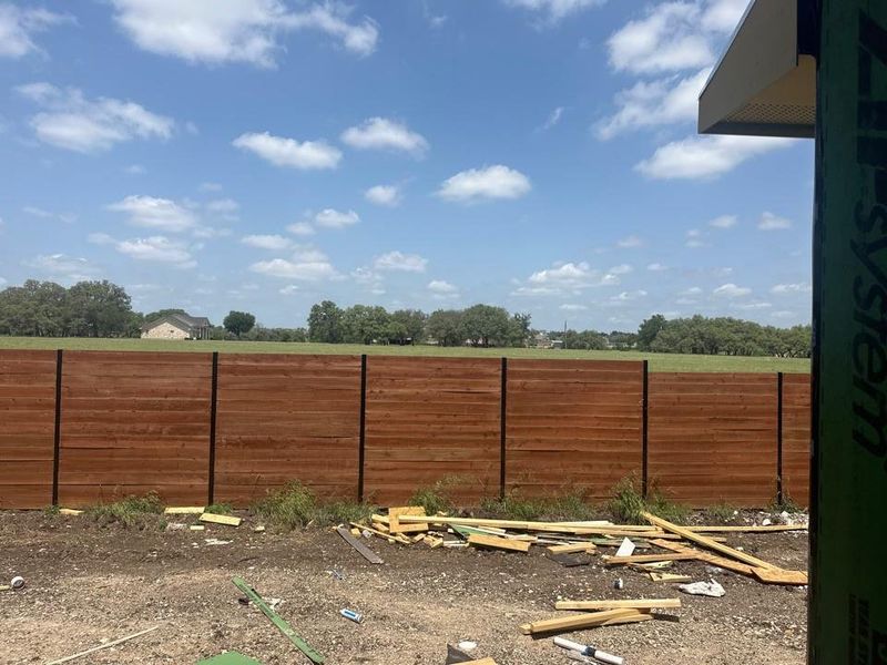 Exterior details and patio area of a home in Broken Oak, Georgetown (Image 2). Exterior details and patio area of a home in Broken Oak, Georgetown (Image 2).