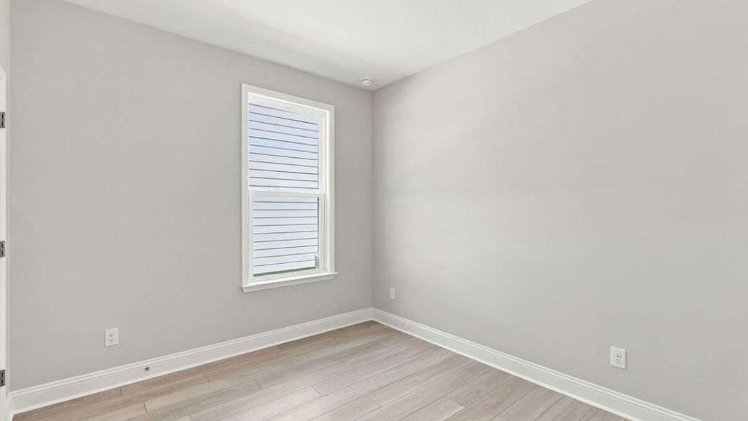 Spacious, unfurnished interior of a new home in Sun City Hilton Head, Bluffton (Image 32).