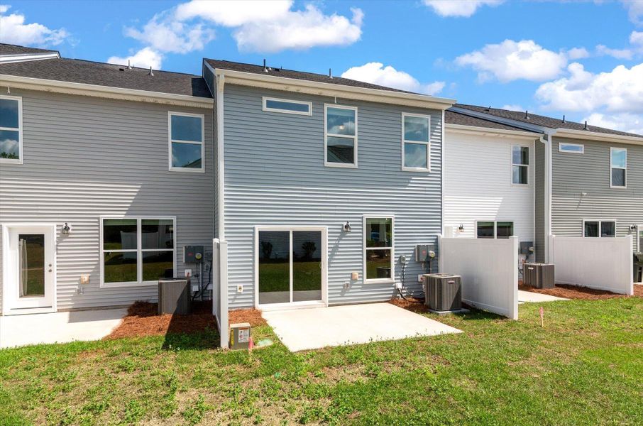 Exterior details and patio area of a home in The Landings at Montague, Goose Creek (Image 25).