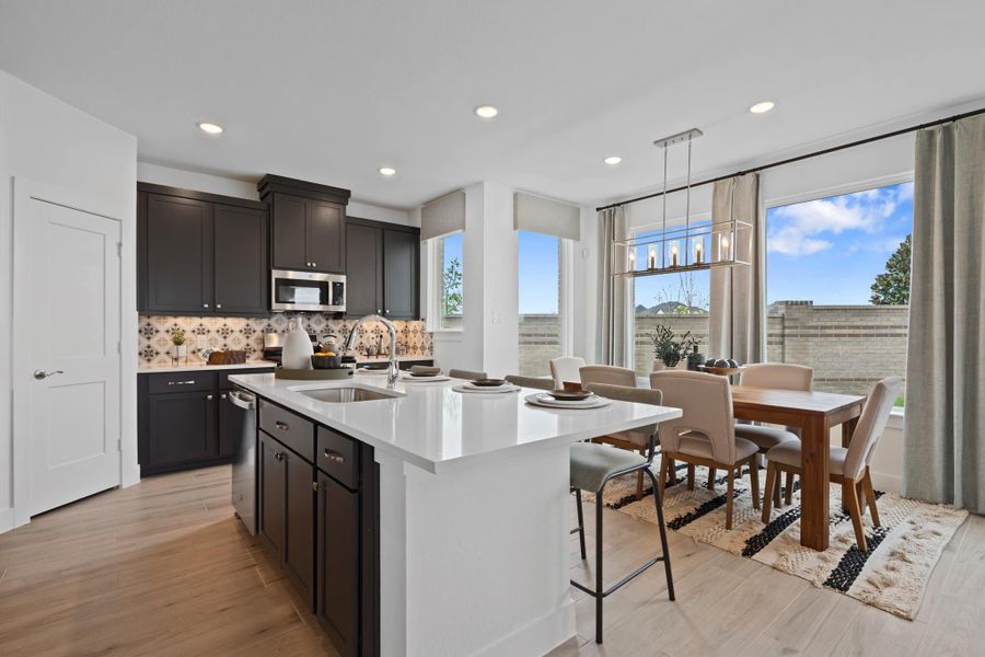 Furnished interior view inside a new home in Bridgeland, Cypress (Image 5).