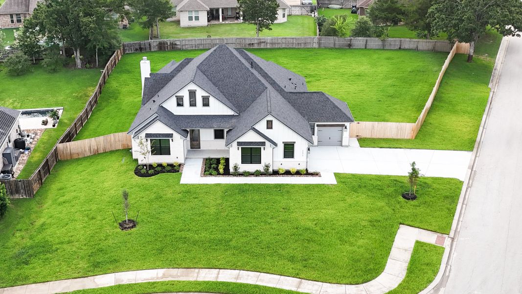 Front exterior of a new home in Greenbrier, Bryan, TX, highlighting curb appeal (Image 27). Front exterior of a new home in Greenbrier, Bryan, TX, highlighting curb appeal (Image 27).