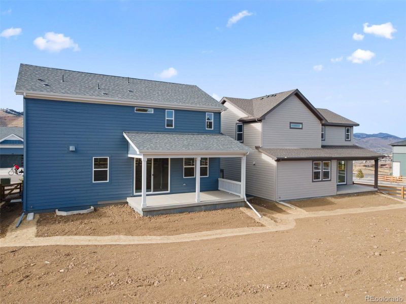 Exterior details and patio area of a home in The Manors Collection at Golden Overlook, Golden (Image 4).