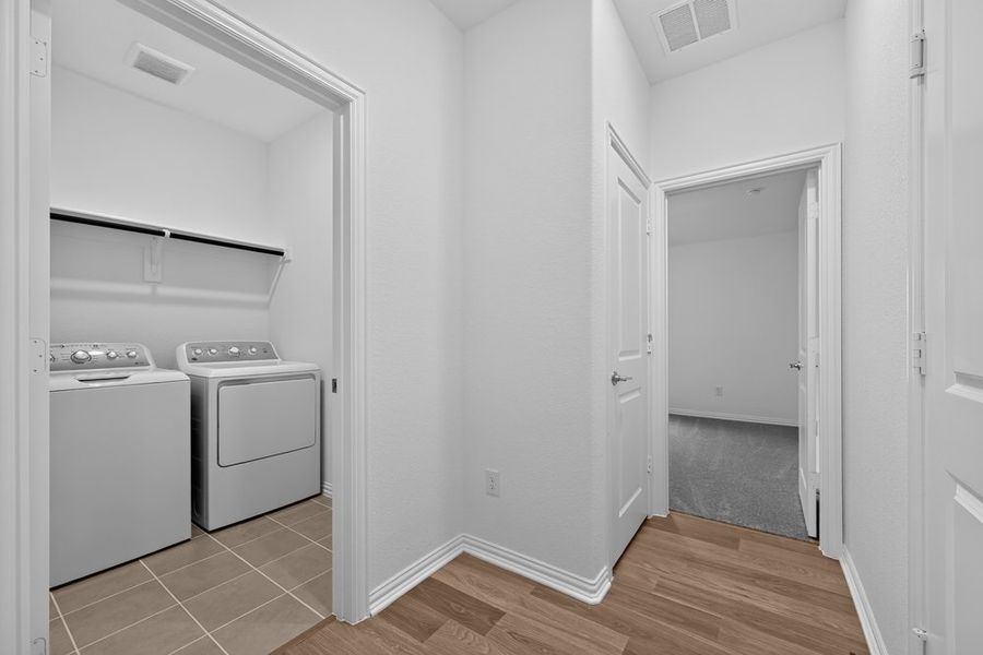 Furnished interior view inside a new home in Parks at Foster Crossing, Anna (Image 11).
