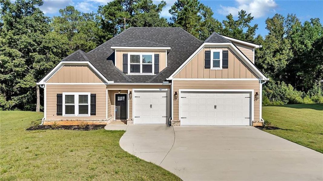 Front exterior of a new home in , Macon, GA, highlighting curb appeal (Image 25).