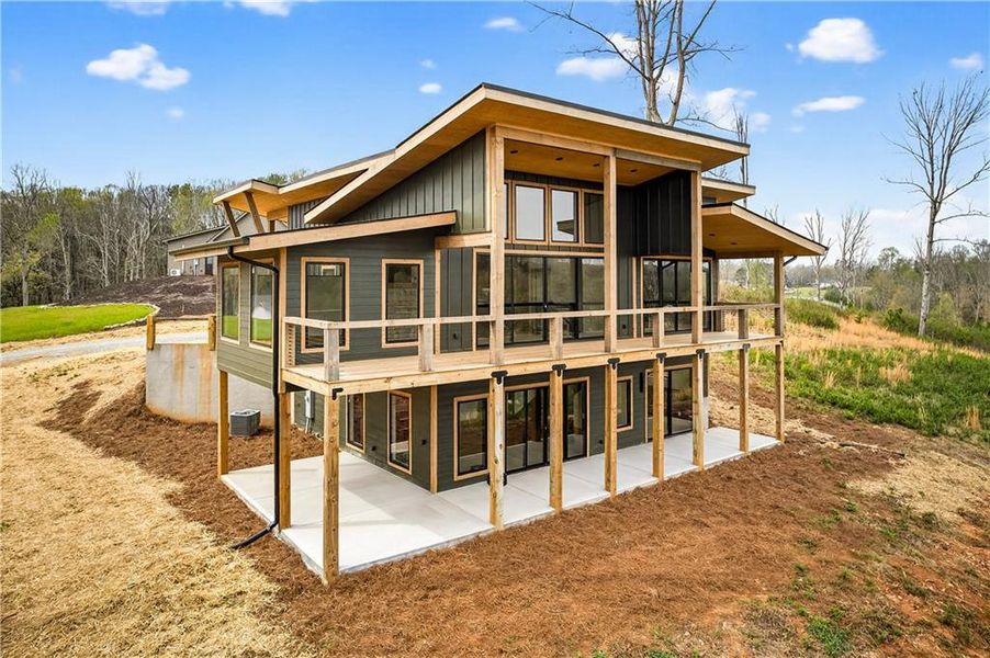 Exterior details and patio area of a home in , Ellijay (Image 27).