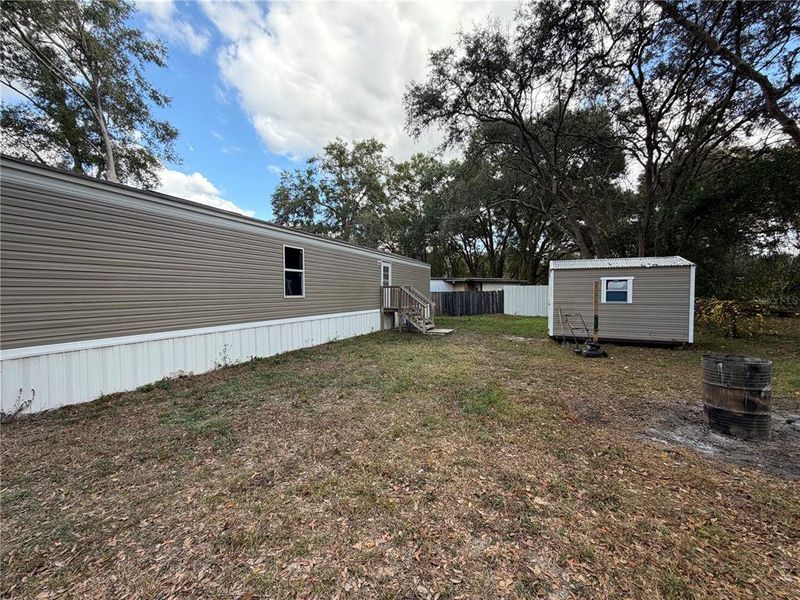 Exterior details and patio area of a home in , Summerfield (Image 15).