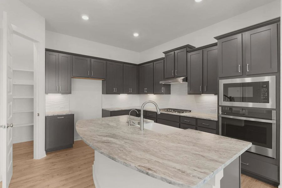 Furnished interior view inside a new home in The Grove at Blackhawk, Pflugerville (Image 4).