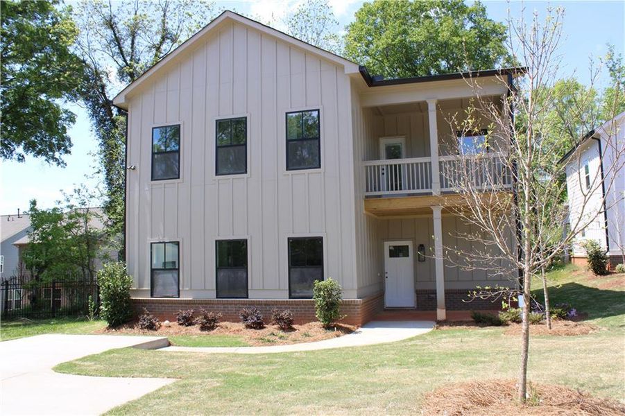 Front exterior of a new home in , Scottdale, GA, highlighting curb appeal (Image 10).