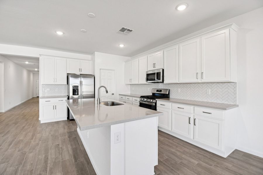 Kitching featuring our designer curated Timeless Collection. Finishes may vary