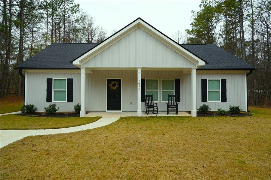 Front exterior of a new home in , Bremen, GA, highlighting curb appeal (Image 1).
