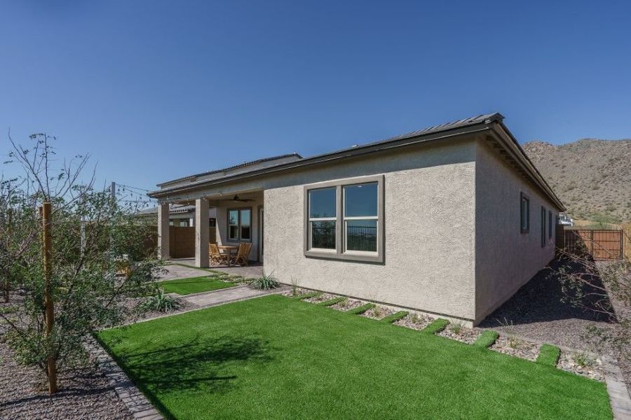 Exterior details and patio area of a home in The Ridge at Sienna Hills, Buckeye (Image 25).