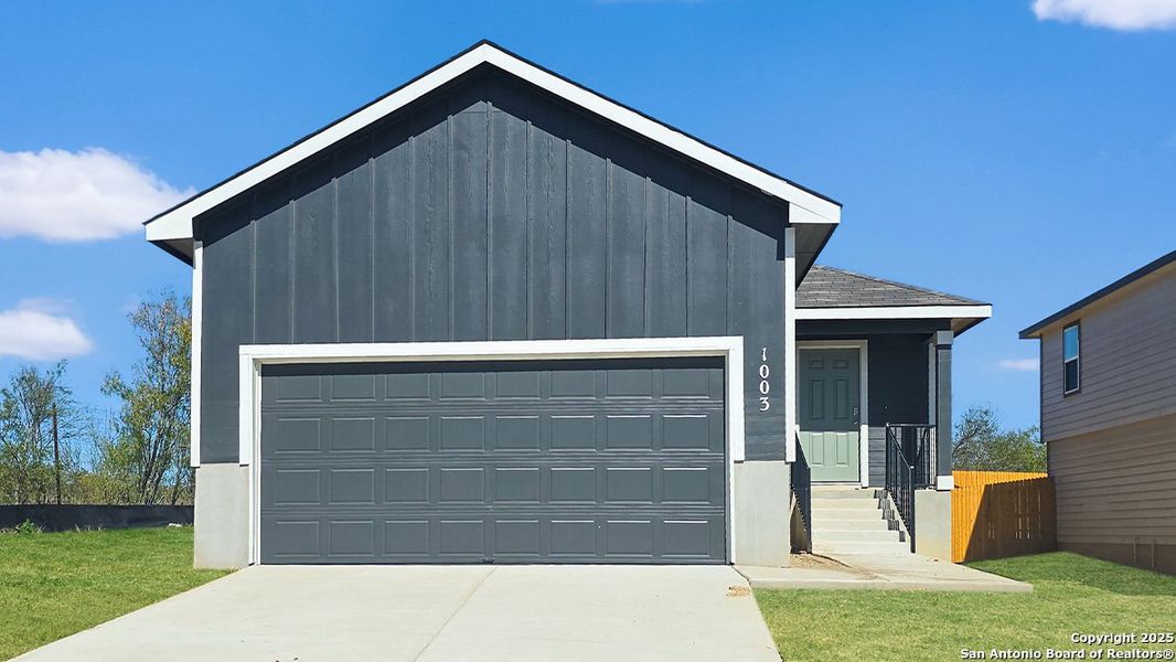 Front exterior of a new home in Lucero, San Antonio, TX, highlighting curb appeal (Image 1).