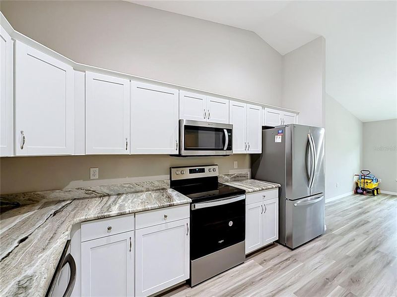 Furnished interior view inside a new home in , Dunnellon (Image 39).