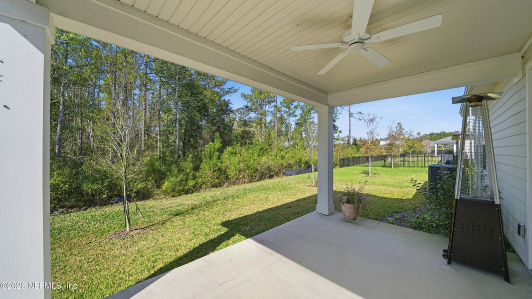 Exterior details and patio area of a home in Tributary, Yulee (Image 28).