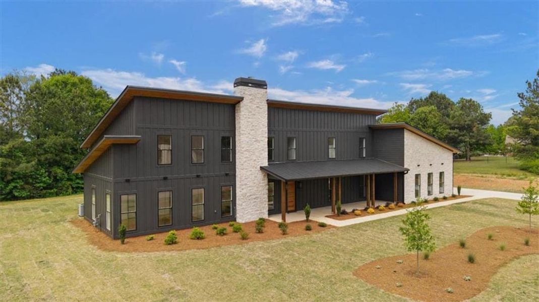 Front exterior of a new home in , Bremen, GA, highlighting curb appeal (Image 25).