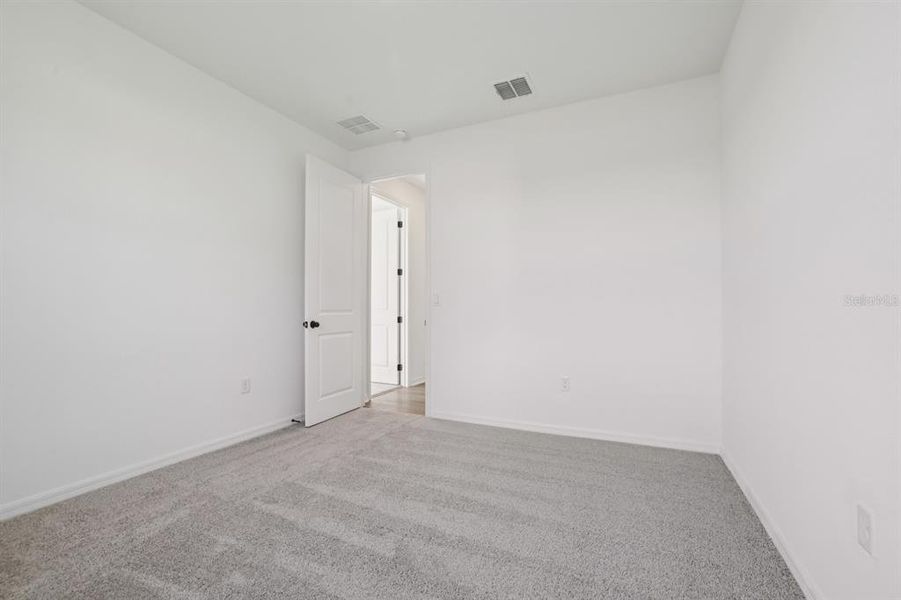 Spacious, unfurnished interior of a new home in Tyson Reserve, St. Cloud (Image 29).