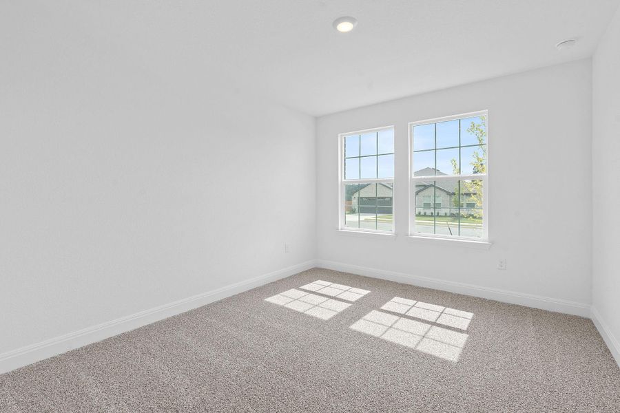 Spare room featuring carpet flooring and recessed lighting Spare room featuring carpet flooring and recessed lighting
