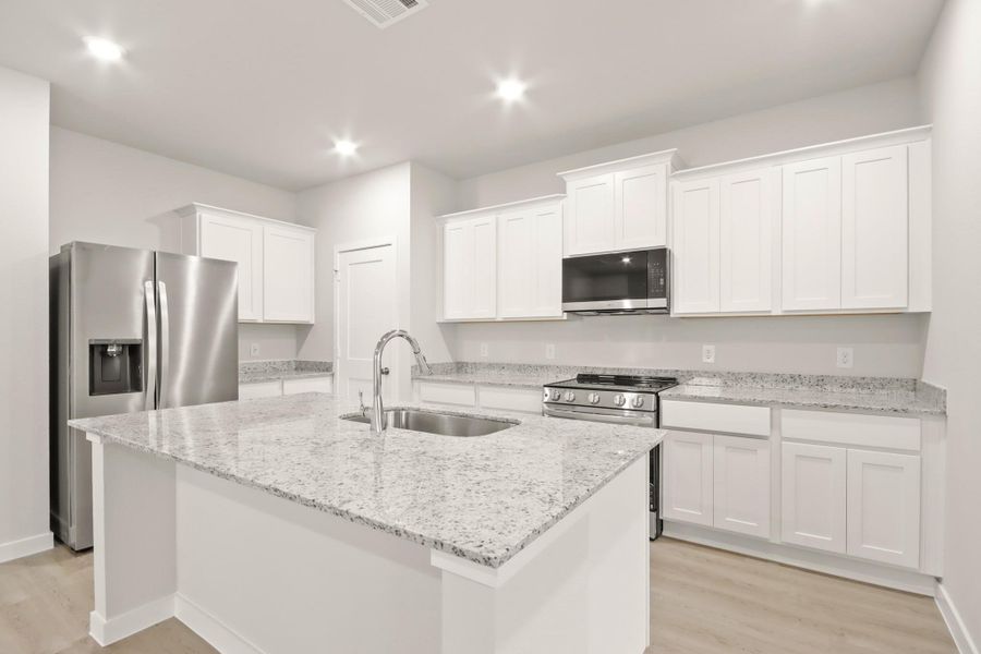 Furnished interior view inside a new home in Crockett Meadows, Conroe (Image 8).