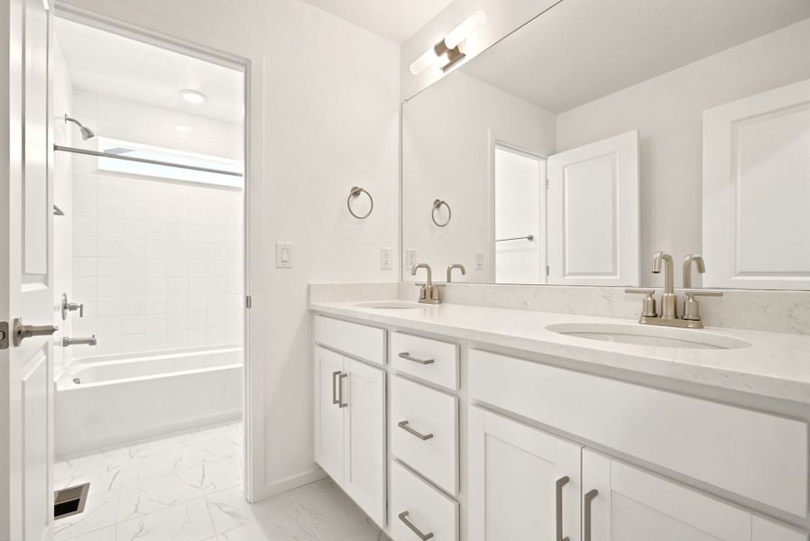 Furnished interior view inside a new home in Cordovan, Firestone (Image 8).