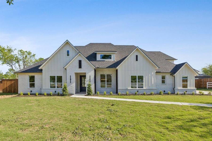 Front exterior of a new home in , Rowlett, TX, highlighting curb appeal (Image 20). Front exterior of a new home in , Rowlett, TX, highlighting curb appeal (Image 20).