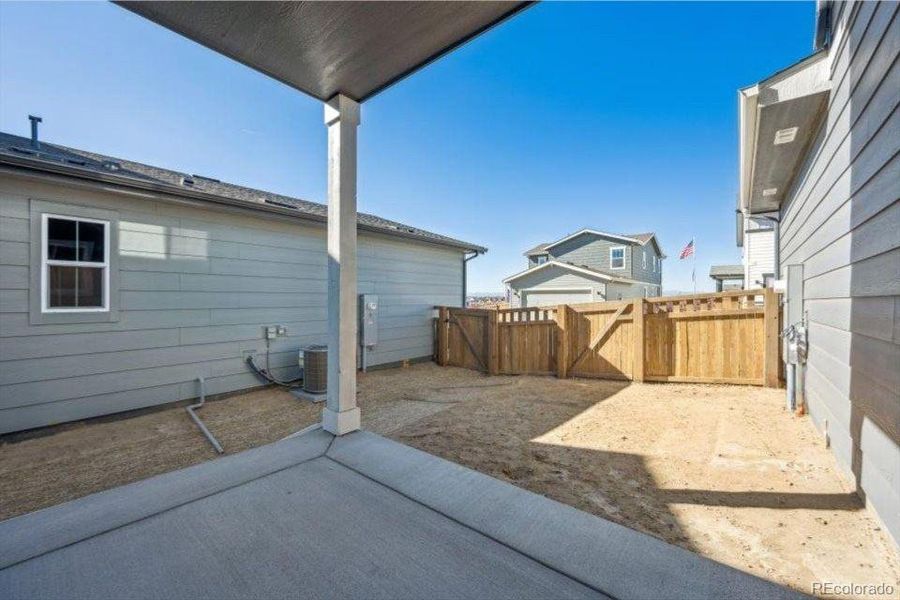 Exterior details and patio area of a home in The Boulevard II Collection at Windler, Aurora (Image 13).