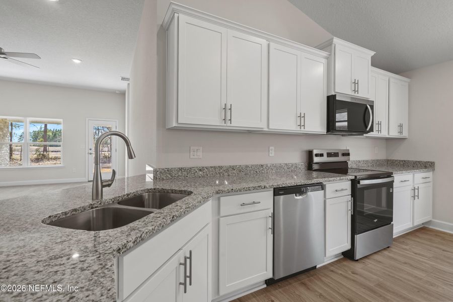 Furnished interior view inside a new home in Shadow Crest at Rolling Hills, Green Cove Springs (Image 3).