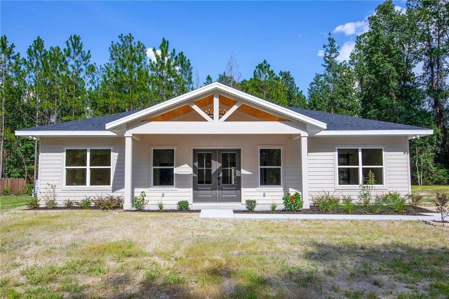 Exterior details and patio area of a home in , Raiford (Image 3).